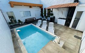 Casa compacta com piscina